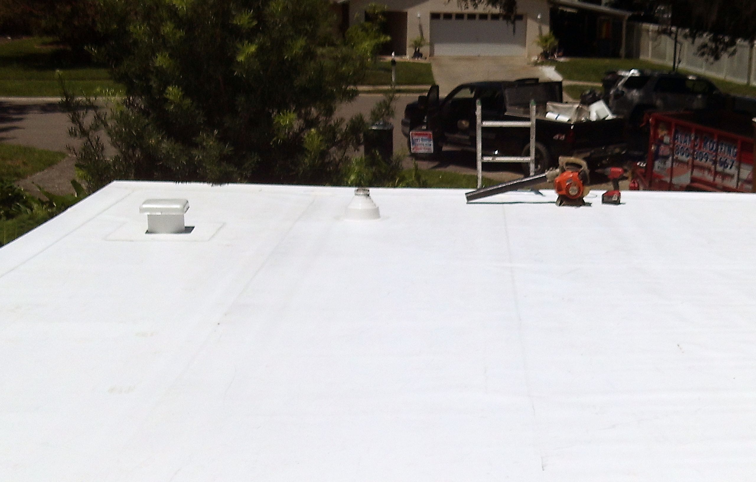 white flat residential roof in central Florida
