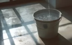 roof leak bucket on floor