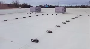 TPO roof on a commercial building in Port Charlotte with HVAC system.