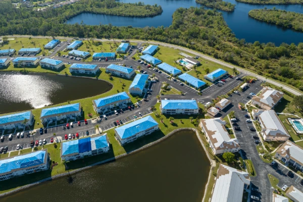 Aerial view of commercial property complex in Central Florida requiring roof replacement permit and building code compliance